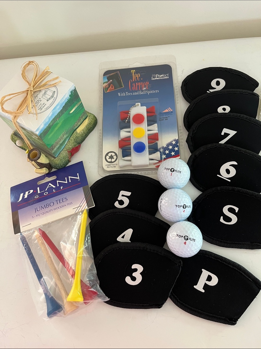 Golfers Accessory Pkg-tees w/ holder,head covers, top flite balls & notepad